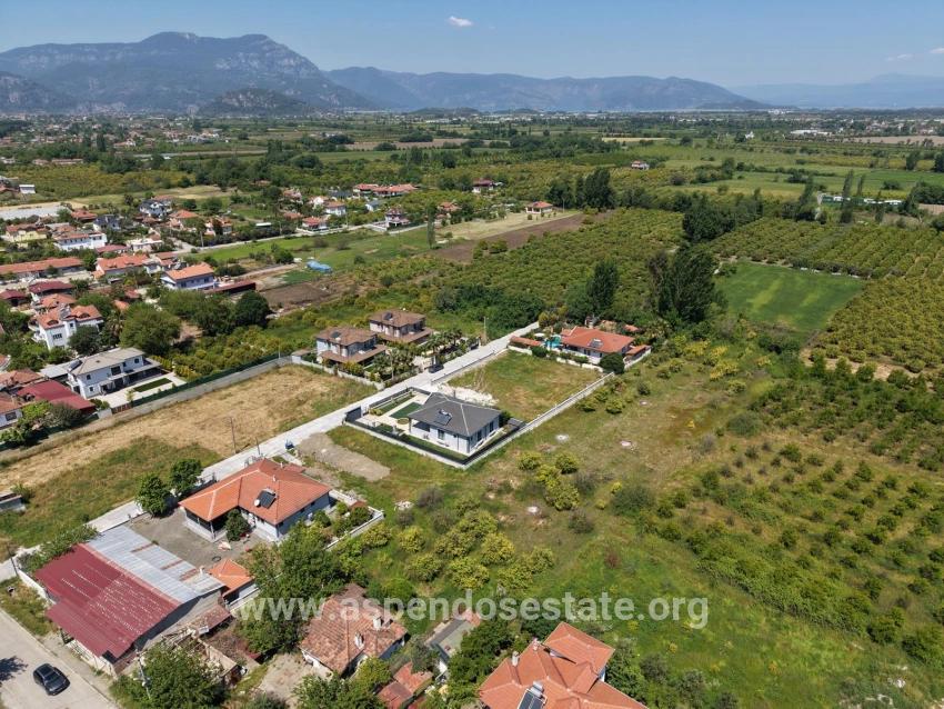 Land For Sale In Okçular, 1050m2, In The Village Residential Area.