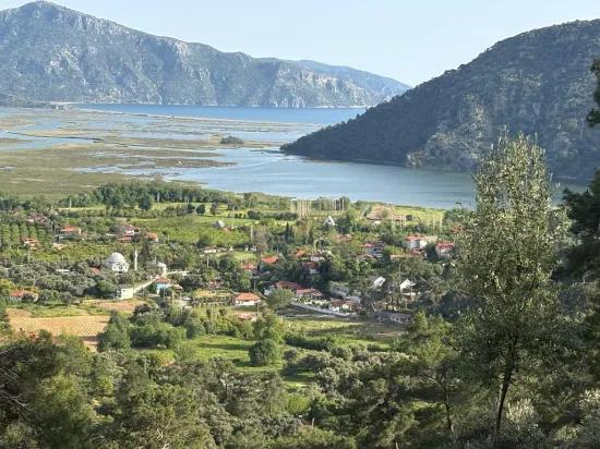 In Çandır, a 1252m2 field for sale with lake and nature view