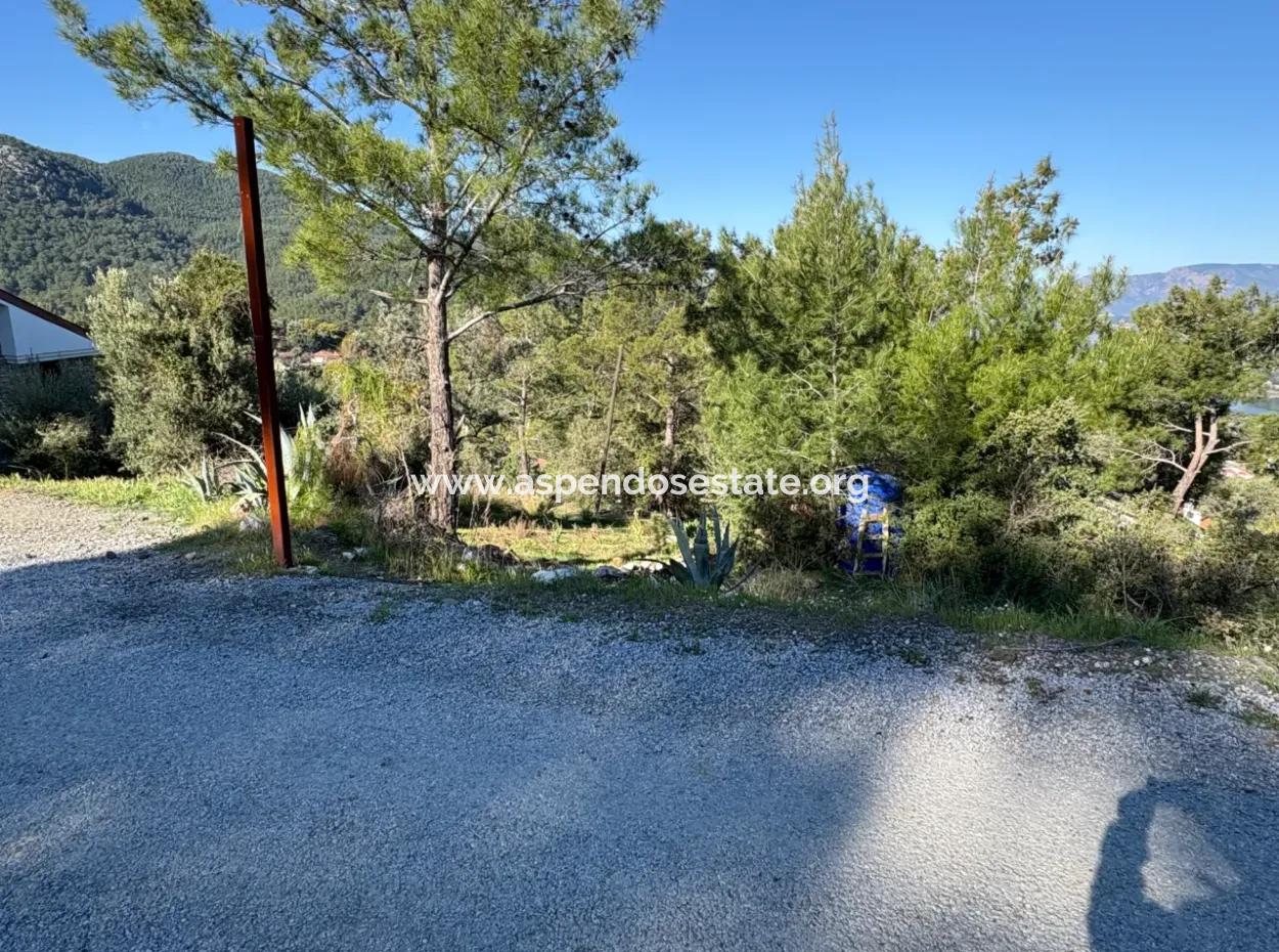 Gökbel'de Köy Yerleşik Alanı İçerisinde Deniz Manzaralı 1000M2 Satılık Arazi